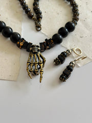 Antique Gold Rock n Roll Skull Necklace