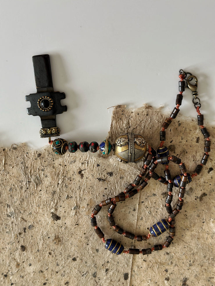 Hand Knotted Rosary with Carved Bone Inlaid Lapiz Lazuli Cross