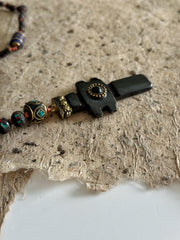 Hand Knotted Rosary with Carved Bone Inlaid Lapiz Lazuli Cross