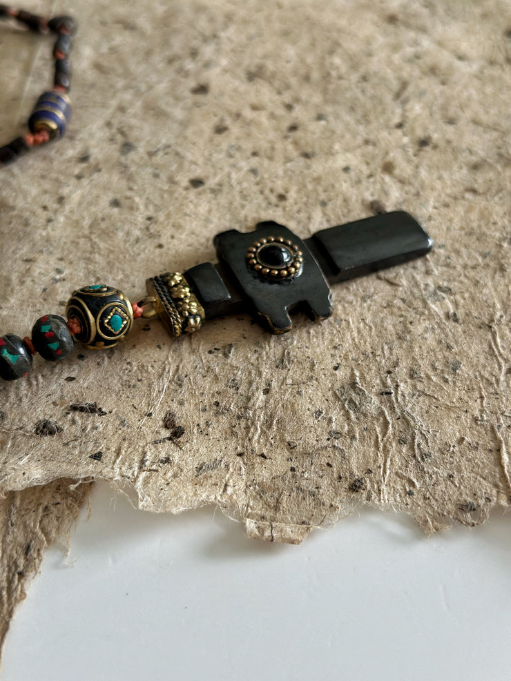 Hand Knotted Rosary with Carved Bone Inlaid Lapiz Lazuli Cross